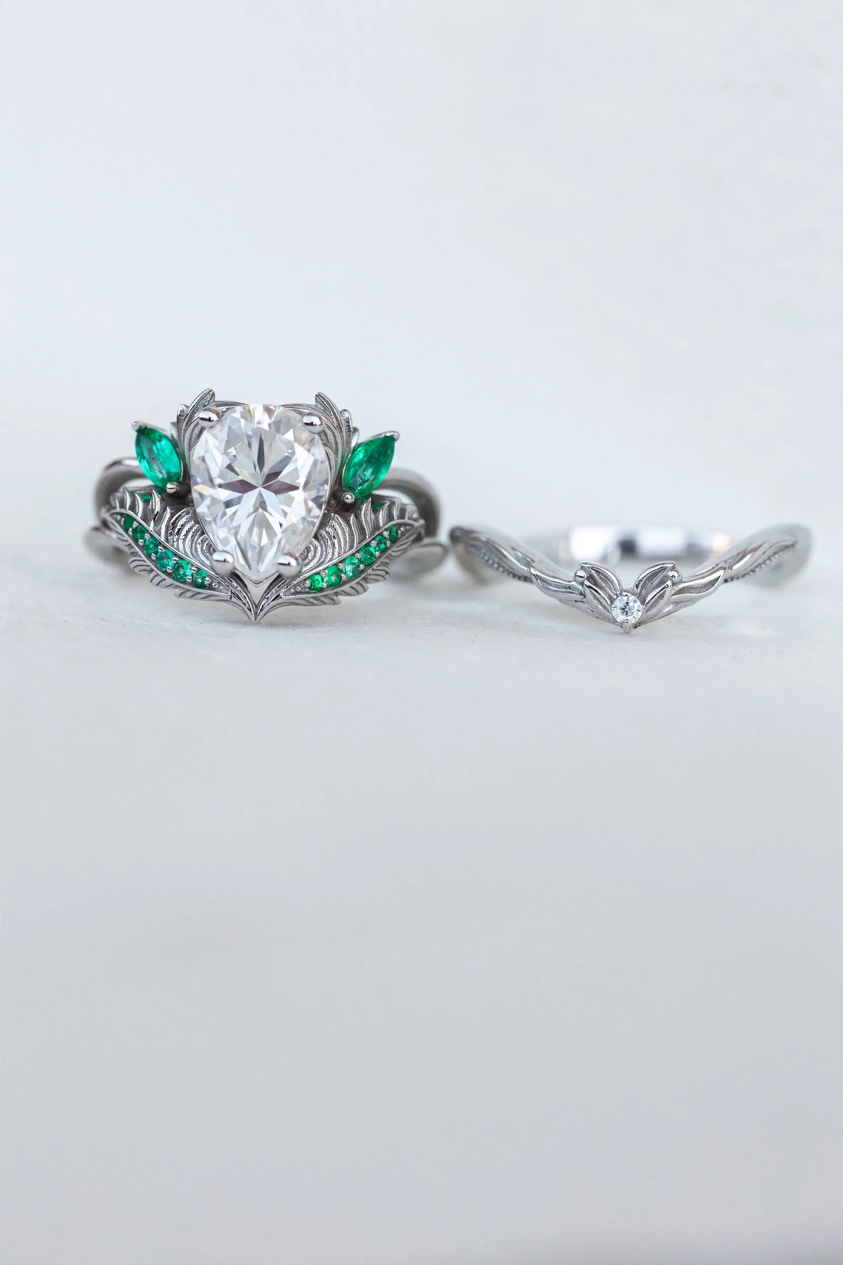 READY TO SHIP: Adonis ring in 14K white gold, moissanite pear cut 9x7 mm, accent moissanite and natural emeralds, AVAILABLE RING SIZES: 4.25-6.25US